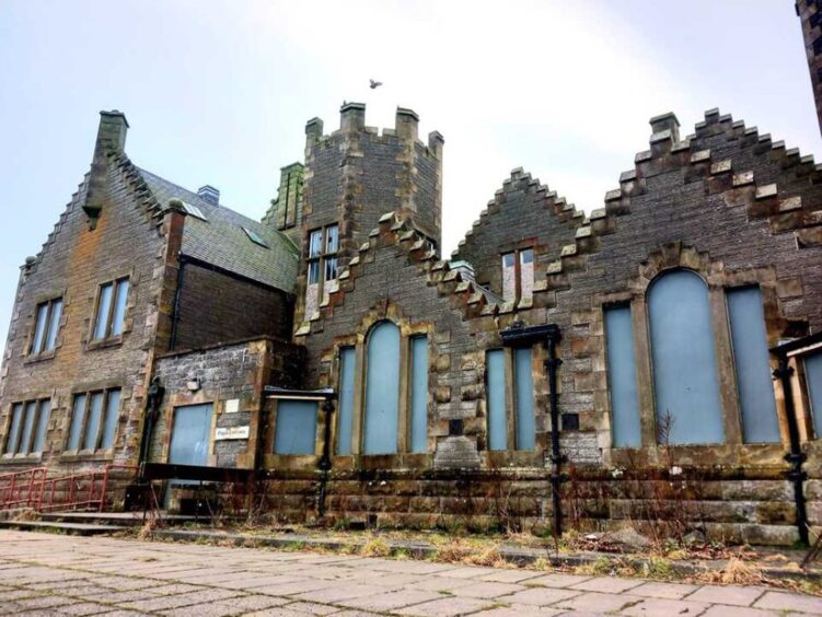 Former Wick High School boarded up. 