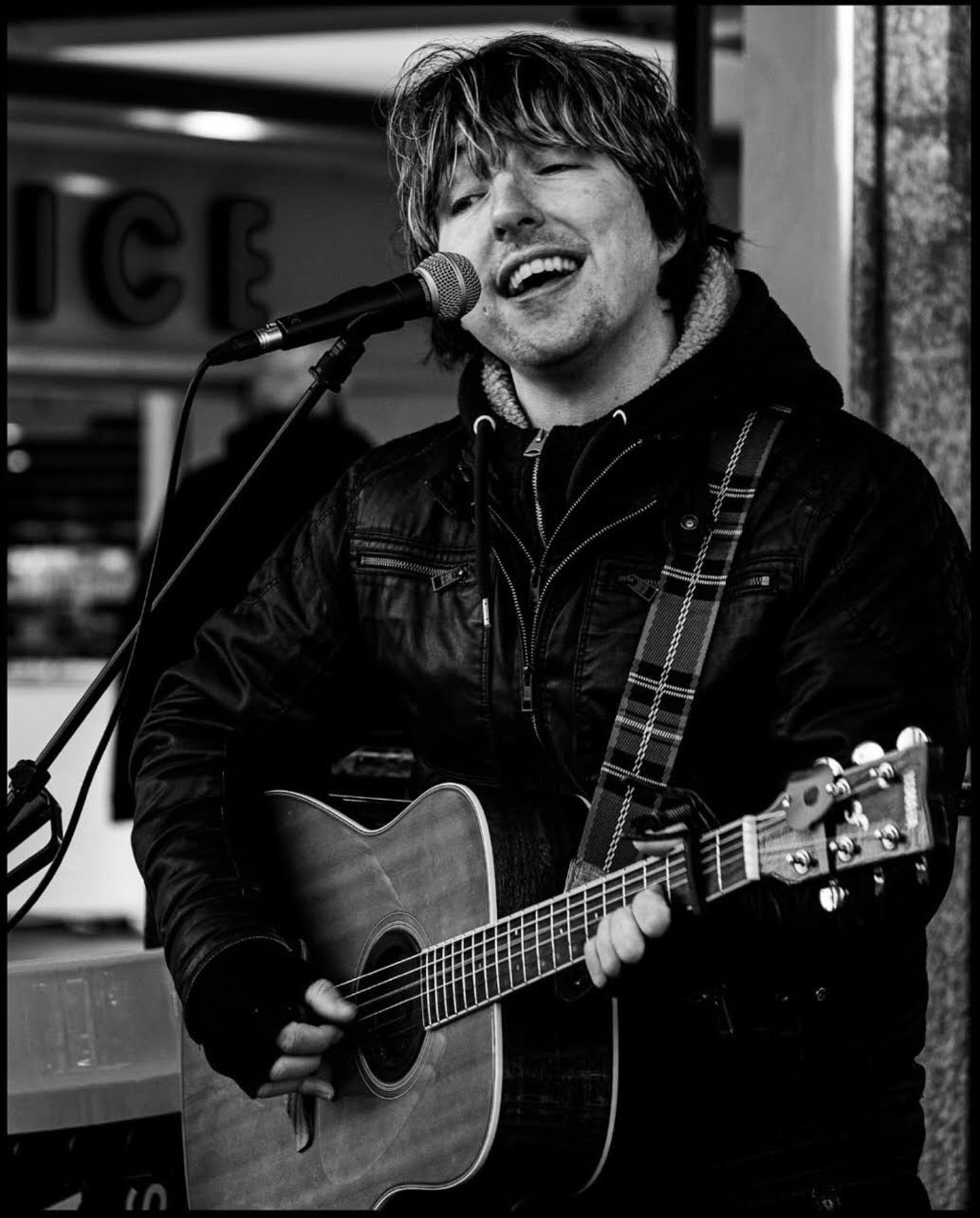 The busker performing in the city.