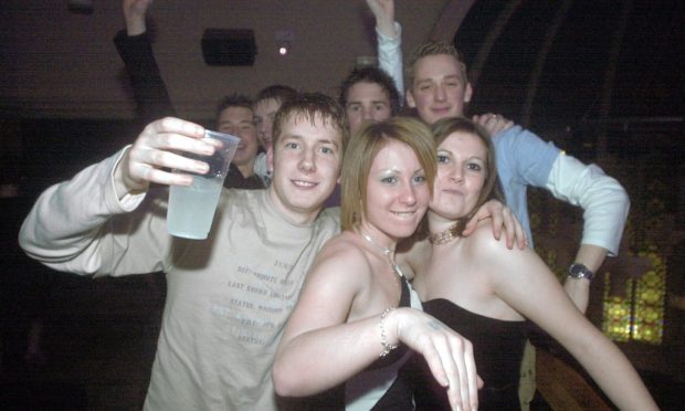 People having fun on Hogmanay at  the Priory  Pic by Michael Traill 31/12/03