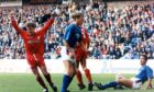 Brian Grant (left) celebrates after scoring Aberdeen's second goal in a 2-0 win against Rangers at Ibrox in September 1991.