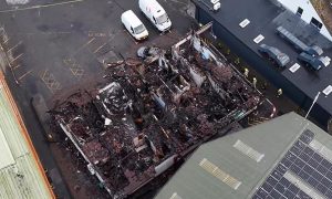 View from the air of business damaged in a devastating fire in Inverness.