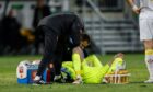 Bulgaria's Dimitar Mitov receives treatment for an injury in the Nations League play-off first leg match against Ireland. Image: Shutterstock.