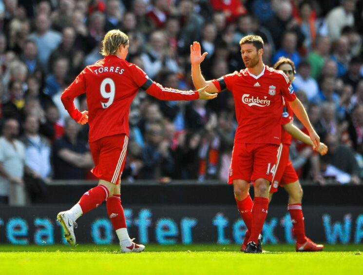 Liverpool's Xabi Alonso congratulates Liverpool's Fernando Torres on his first goal Liverpool vs Blackburn Barclays Premiership Anfield Liverpool UK 11/04/2009.