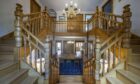 Tower House is up for sale. The staircase is just one impressive feature. Image: Savills.