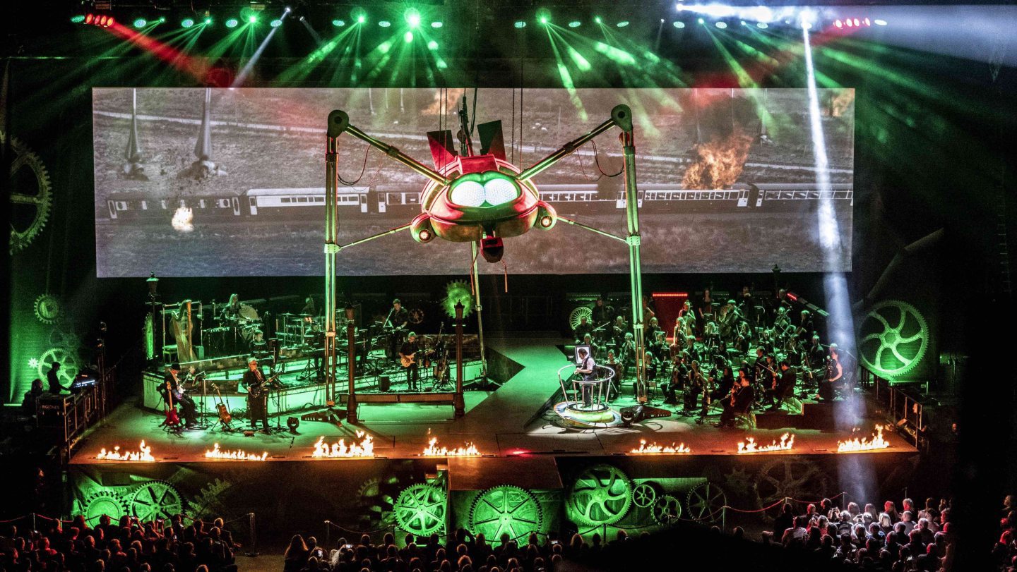 An alien spider like ship crawls along the stage in Jeff Wayne's The War of the Worlds.