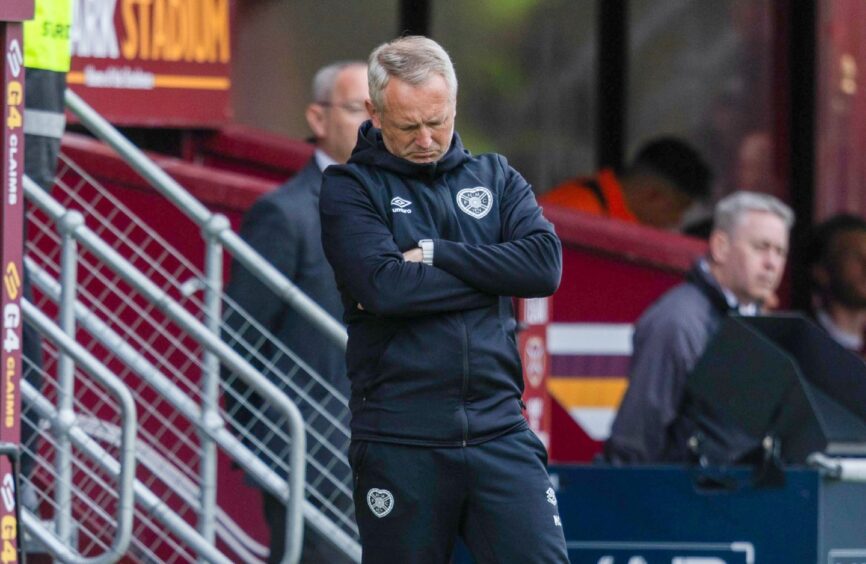 Hearts head coach Neil Critchley looks dejected during the William Hill Premiership match between Motherwell and Heart of Midlothian at Fir Park Stadium, on April 12, 2025. Image: SNS.