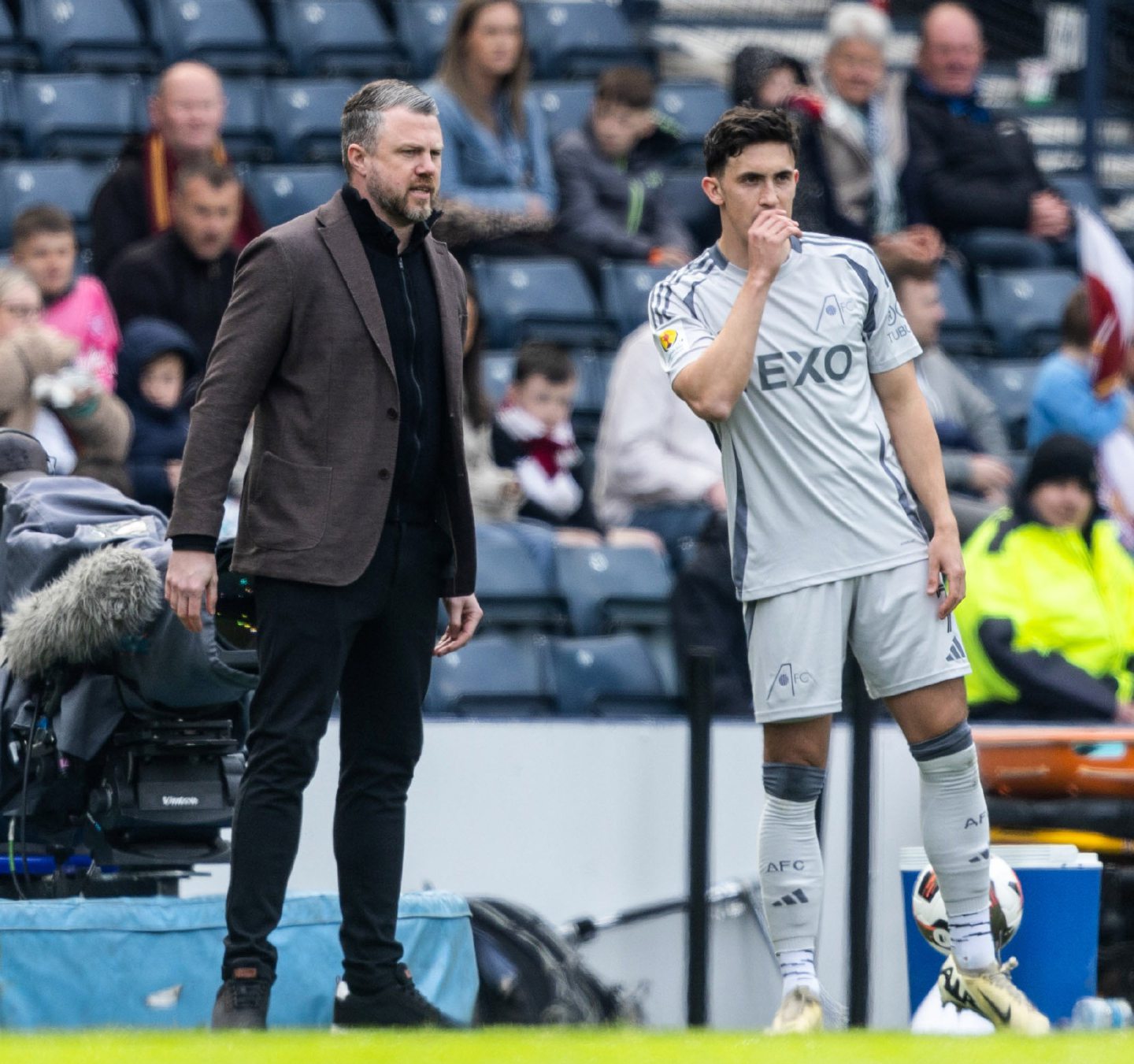 Aberdeen's Jamie McGrath (R) and manager Jimmy Thelin before the latter was sent on at Hampden against Hearts. Image: SNS.