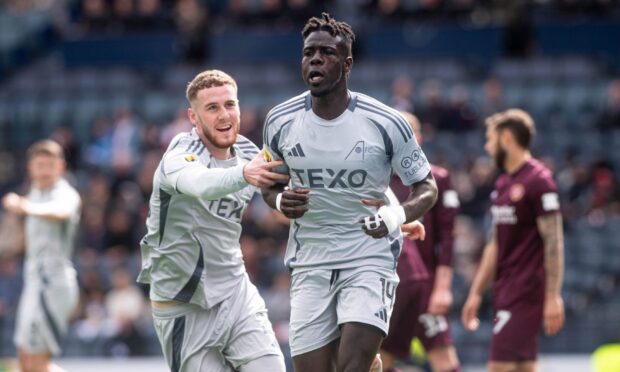 Aberdeen's Pape Gueye celebrating after Aberdeen's opening goal against Hearts. Image: Darrell Benns/DC Thomson.