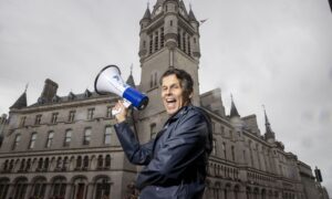 Robin Galloway in front of the Town House in Aberdeen. Image: DC Thomson