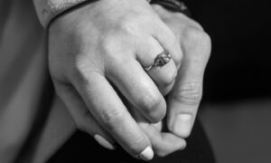Holding on to one another, a Torry couple who have had to cancel their wedding plans due to Raac. Image by Kami Thomson / DC Thomson.