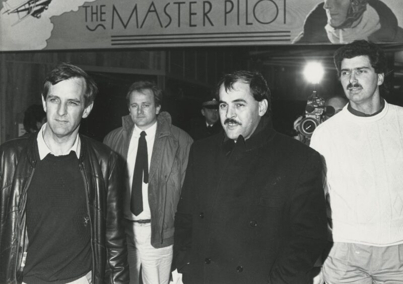 Flanked by detectives, Hajdin Sejdija arrives in Aberdeen in January 1990 after being arrested in connection with the Britoil scandal.