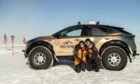 Chris and Julie at the South Pole. Image: Plug In Adventure