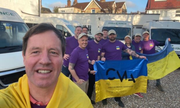 Highlands MP Angus MacDonald went to Ukraine in a convoy to deliver ambulances filled with medical equipment. Image: Supplied.