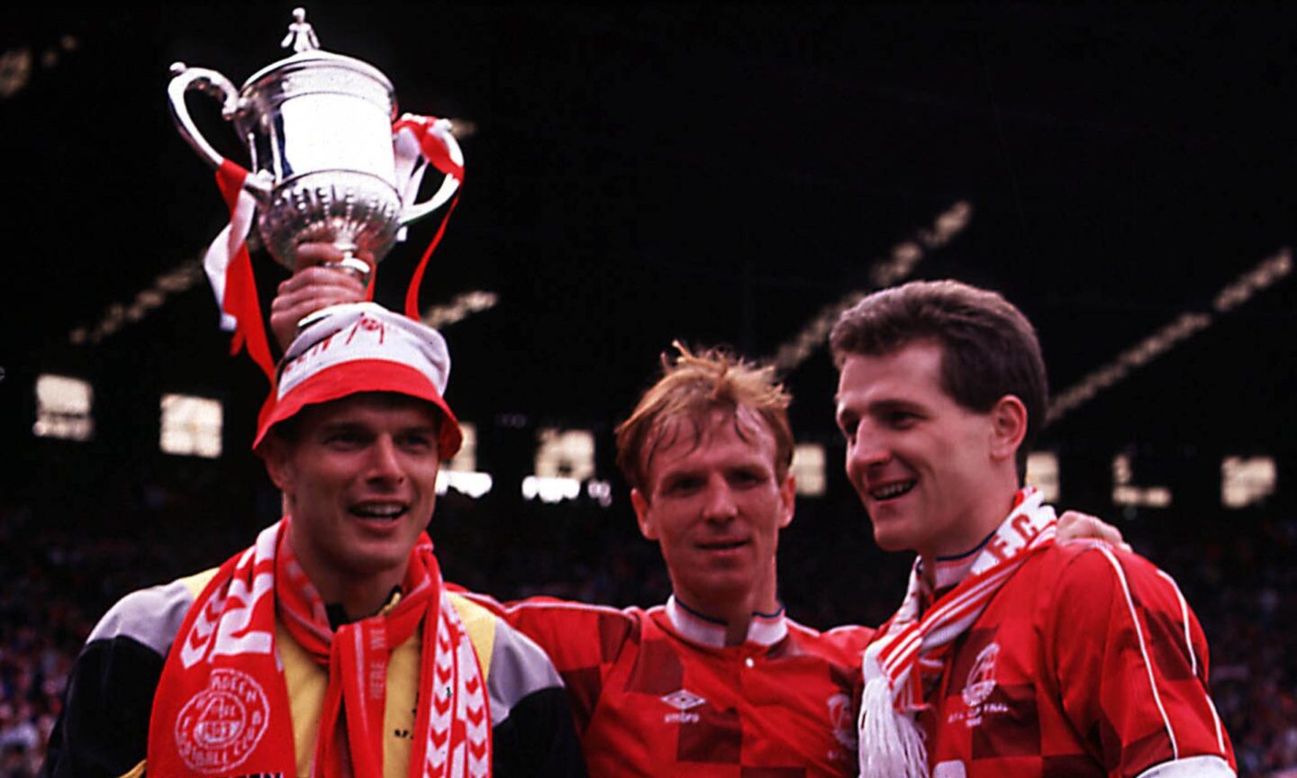Aberdeen trio Theo Snelders (left), Alex McLeish (centre) and Brian Irvine celebrate the Scottish Cup win at Hampden in 1990.