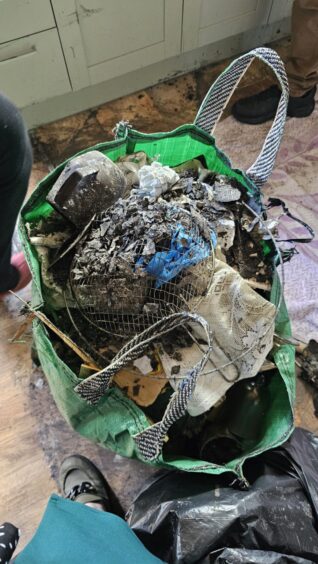 Bag of fire ravaged items.