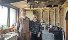 Veronica Tomlins and her son Robert following a fire at her home in Forres.