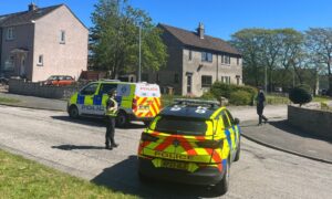 Police in the Mastrick area of Aberdeen. Image: DC Thomson