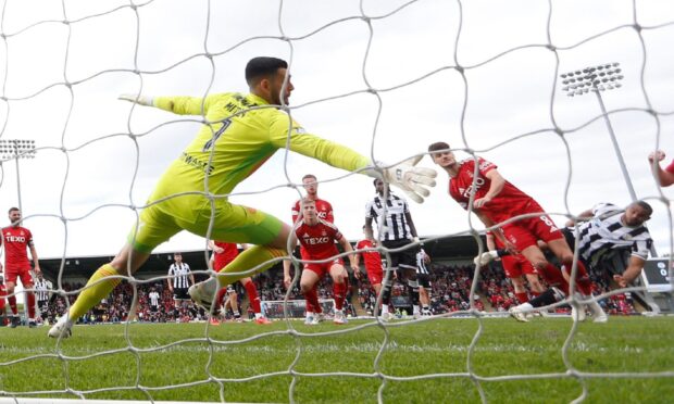 St Mirren's Mikael Mandron scores in a 1-0 win against Aberdeen in Paisley.