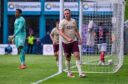 Lawrence Shankland celebrates after scoring to make it 2-1 Hearts against Ross County. Image: Shutterstock.