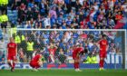 Dejected Aberdeen players after Jefte of Rangers makes it 4-0 at Ibrox. Image: Shutterstock