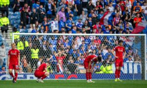 Dejected Aberdeen players after Jefte of Rangers makes it 4-0 at Ibrox. Image: Shutterstock