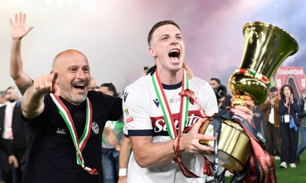 Vincenzo Italiano, head coach of Bologna FC, and Lewis Ferguson of Bologna FC celebrate with the trophy at the end of the Coppa Italia final against AC Milan at the Stadio Olimpico in Rome. Image: Shutterstock