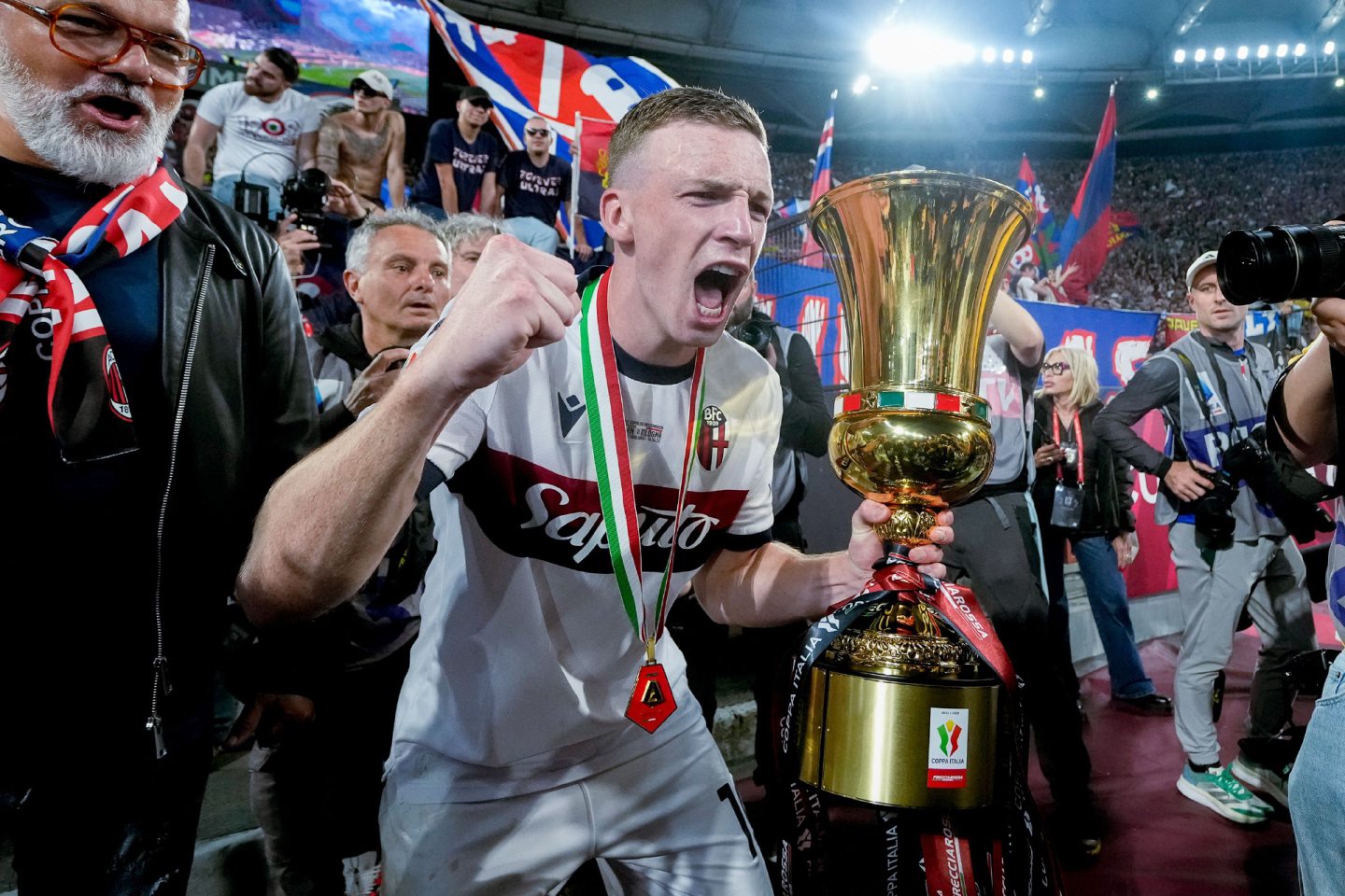 Lewis Ferguson of Bologna FC with the Coppa Italia trophy after beating AC Milan in the final. Image by Shutterstock