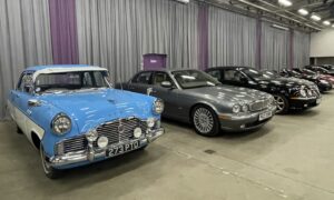 A 1962 Ford Zephyr next to some of the other vehicles that were sold in Thainstone's online auction.