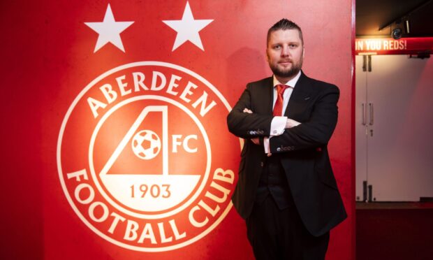 Aberdeen FC chief executive Alan Burrows is urging the council to "begin a more constructive and collaborative dialogue"