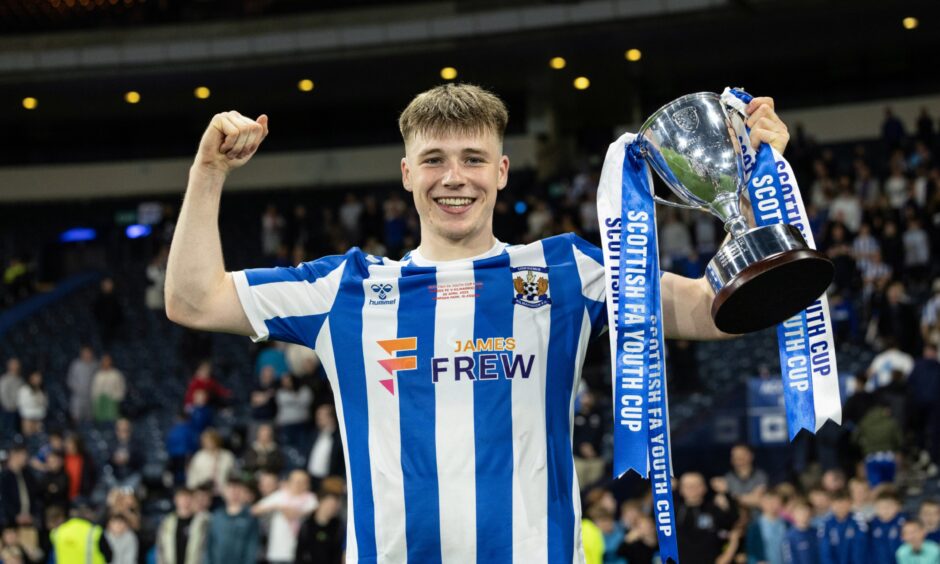 Kilmarnock's Ben Brannan lifts the Scottish Youth Cup after his side defeated Dundee in the final at Hampden Park, Glasgow, on April 30, 2025. 