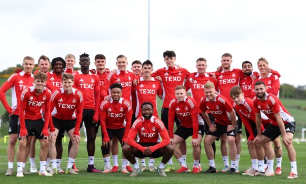 The Aberdeen squad with Player of the Year Shayden Morris at the front pictured at Cormack Park. Image: SNS