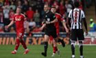 Referee Ross Hardie after ruling out an Aberdeen goal for a Kevin Nisbet handball during a William Hill Premiership match between St Mirren and Aberdeen at the SMiSA Stadium, on May 3, 2025, in Paisley, Scotland. Image: SNS.