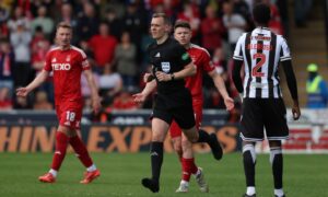 Referee Ross Hardie after ruling out an Aberdeen goal for a Kevin Nisbet handball during a William Hill Premiership match between St Mirren and Aberdeen at the SMiSA Stadium, on May 3, 2025, in Paisley, Scotland. Image: SNS.