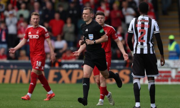 Referee Ross Hardie after ruling out an Aberdeen goal for a Kevin Nisbet handball during a William Hill Premiership match between St Mirren and Aberdeen at the SMiSA Stadium, on May 3, 2025, in Paisley, Scotland. Image: SNS.