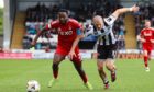 Aberdeen's Shayden Morris and St Mirren's Alex Gogic in action during a William Hill Premiership match between St Mirren and Aberdeen at the SMiSA Stadium, on May 03, 2025, in Paisley, Scotland. (Photo by Craig Williamson / SNS Group)