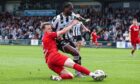 St Mirren's Richard Taylor and Aberdeen's Nicky Devlin in action in Paisley.