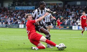 St Mirren's Richard Taylor and Aberdeen's Nicky Devlin in action in Paisley.
