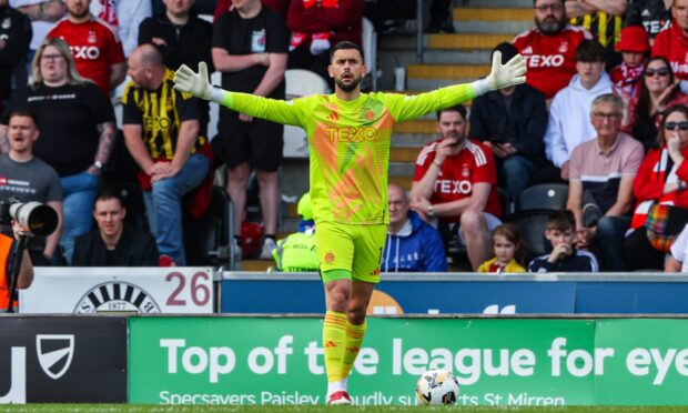 Aberdeen's Dimitar Mitov in action during the 1-0 loss to St Mirren in the Premiership. Image: SNS