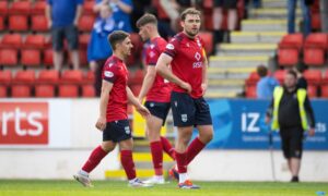 Ross County skipper Connor Randall looks dejected following the defeat to St Johnstone. Image: SNS