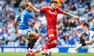 Rangers' Cyriel Dessers and Aberdeen's Dante Polvara. Image: SNS.