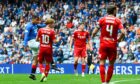 Rangers' Hamza Igamane scores to make it 3-0 against Aberdeen at Ibrox.
