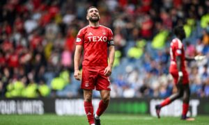 Aberdeen's Graeme Shinnie looks dejected during the 4-0 loss to Rangers at Ibrox.
