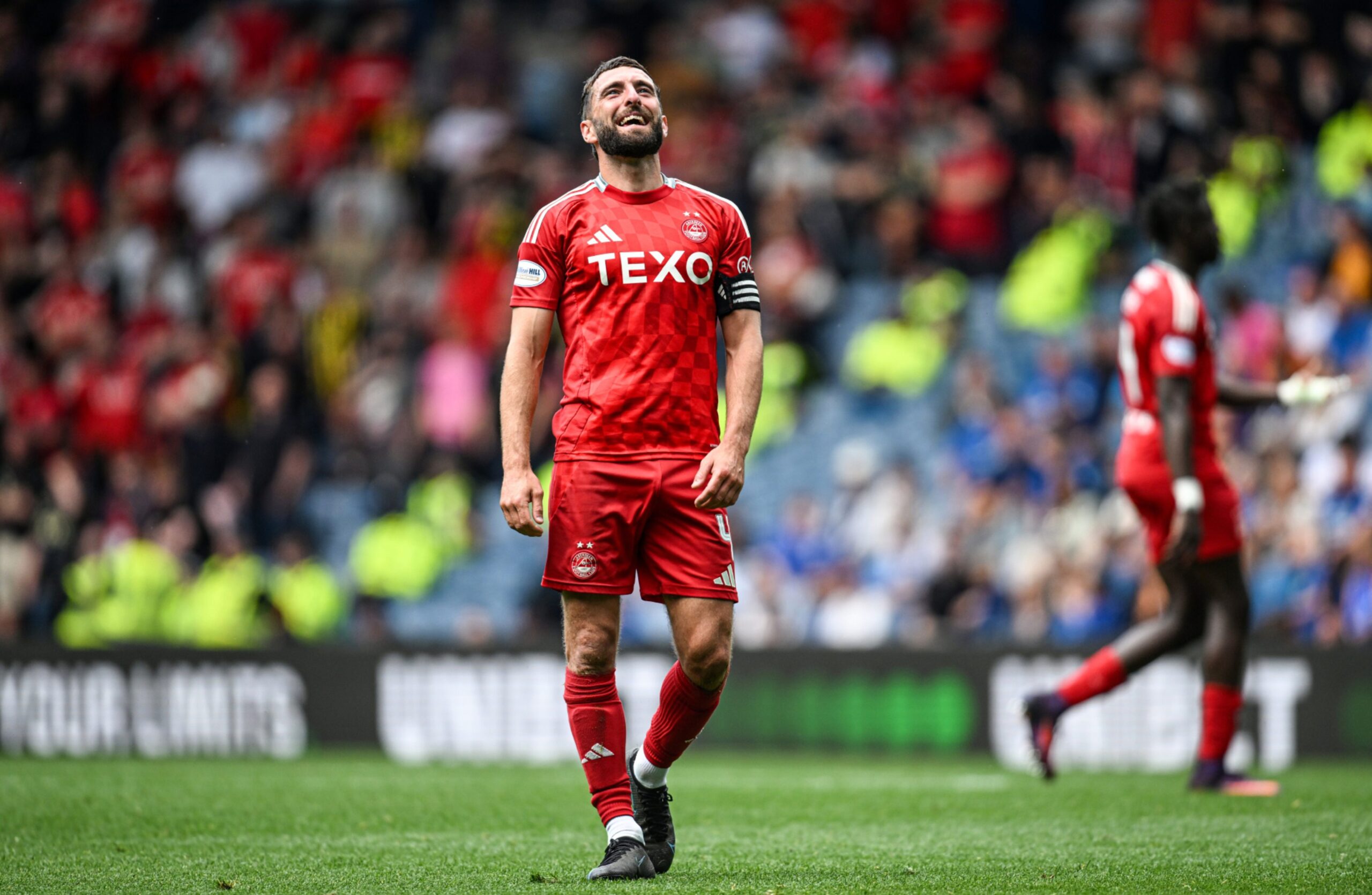 Aberdeen's Graeme Shinnie looks dejected during the 4-0 loss to Rangers at Ibrox. 