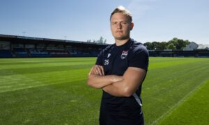 Ross County forward Alex Samuel poses for photographs at Victoria Park.