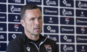 Ross County manager Don Cowie speaks during a press conference.