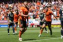 Dundee United's Declan Gallagher (L) celebrates after scoring to make it 1-1 against Aberdeen. Image: SNS