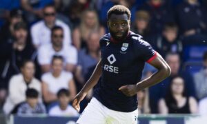 Michee Efete in action for Ross County.
