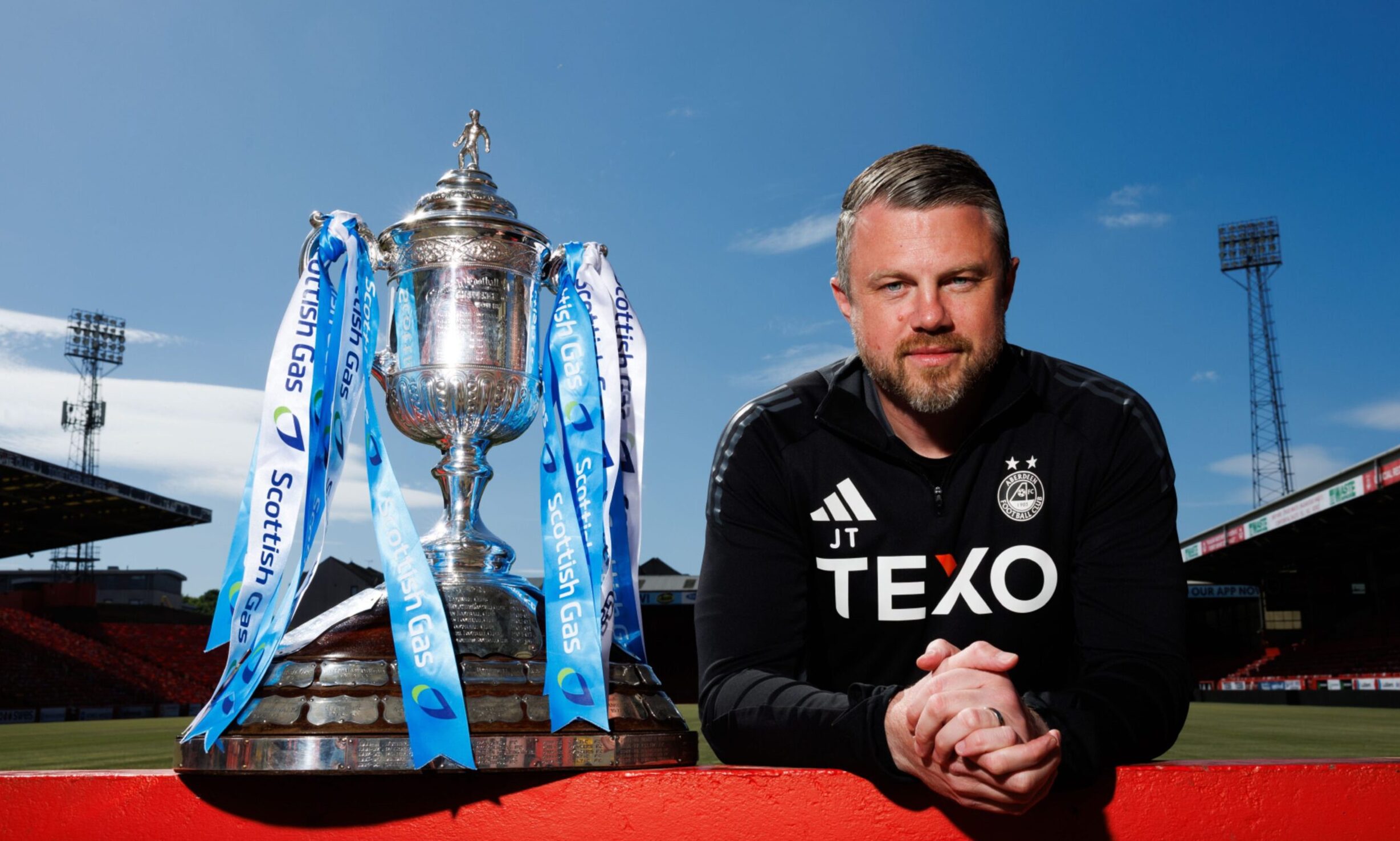 Aberdeen manager Jimmy Thelin with the Scottish Cup at Pittodrie.