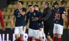 Ross County celebrate their late draw against Livingston.