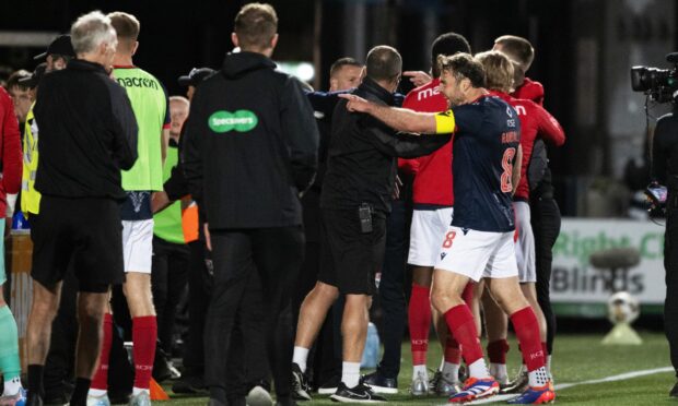 An altercation between Livingston fans and the Ross County coaching staff.